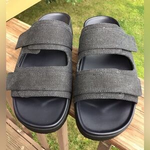 Black and Gray Slide Sandals with adjustable Velcro closure. NIB never worn.